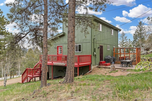 518 Pine Dr, Bailey, CO 80421 - rear view of property featuring a wooden deck, stairs, and a patio