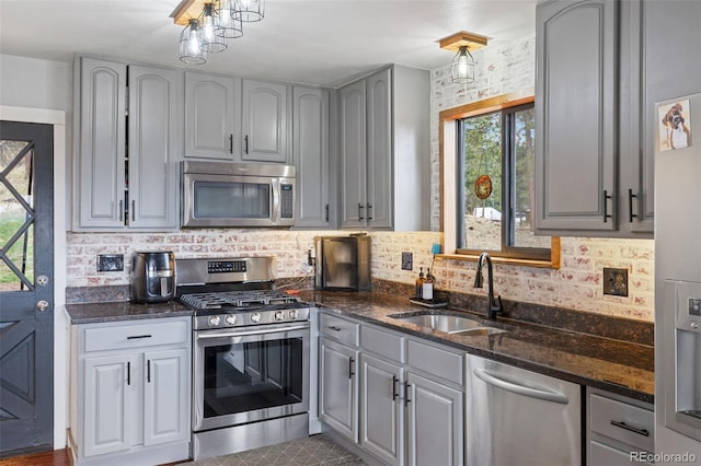 518 Pine Dr, Bailey, CO 80421 - kitchen with appliances with stainless steel finishes, healthy amount of natural light, and gray cabinetry