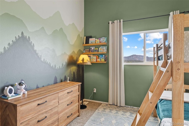 518 Pine Dr, Bailey, CO 80421 - carpeted bedroom featuring a mountain view and baseboards
