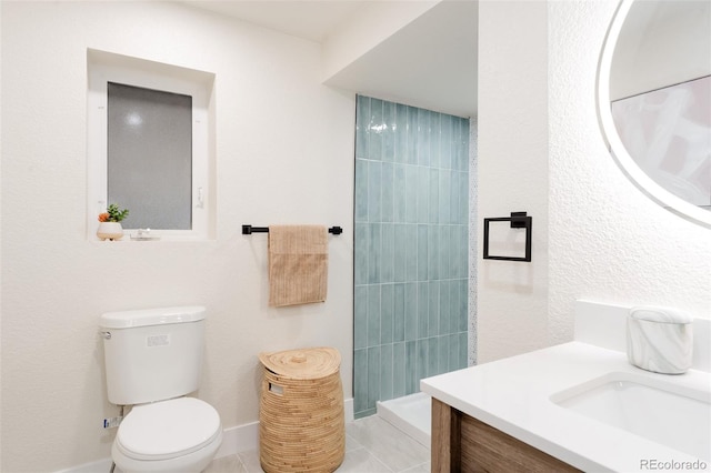 12452 W Dumbarton Pl, Morrison, CO 80465 - bathroom featuring vanity and tiled shower