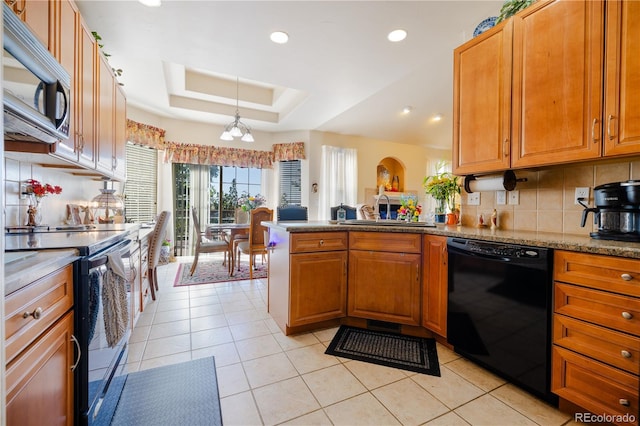 kitchen featuring dishwasher, sink, kitchen peninsula, decorative backsplash, and range with electric stovetop