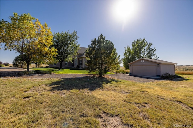 view of yard with a garage