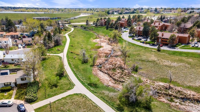 aerial view of property's location with nearby suburban area