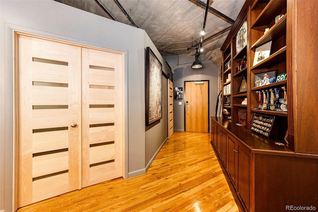1863 Wazee St Unit 4B, Denver, CO 80202 - corridor with light wood-style floors and a sauna / steam room