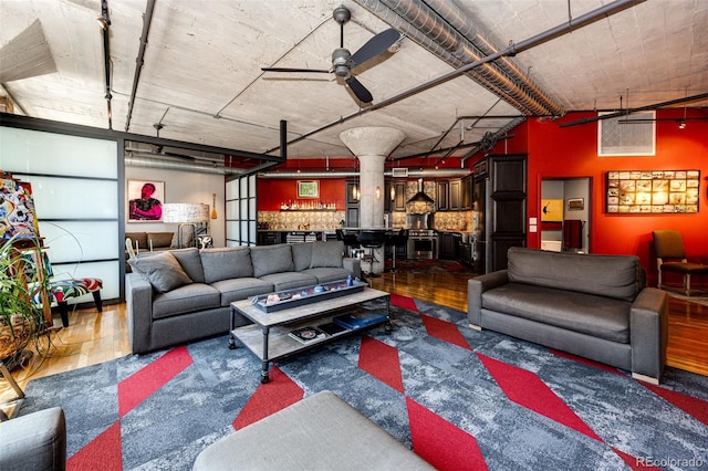 1863 Wazee St Unit 4B, Denver, CO 80202 - living area featuring wood finished floors, a ceiling fan, and bar