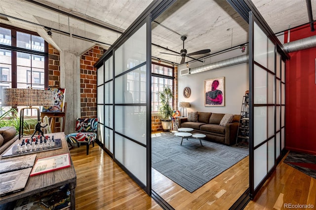 1863 Wazee St Unit 4B, Denver, CO 80202 - living room featuring wood-type flooring and ceiling fan