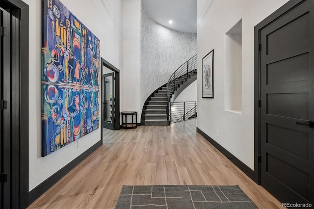 5665 Vistancia Ct, Parker, CO 80134 - entrance foyer with wood finished floors and stairs