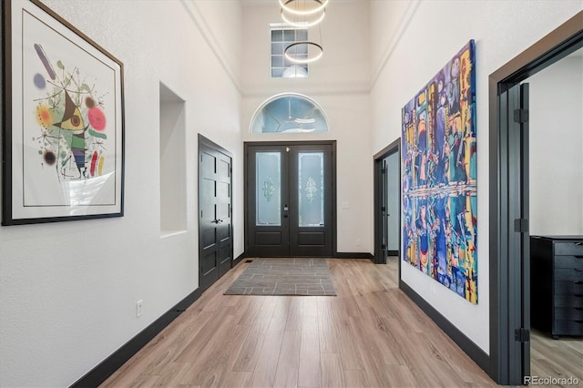 5665 Vistancia Ct, Parker, CO 80134 - foyer with wood finished floors and a towering ceiling