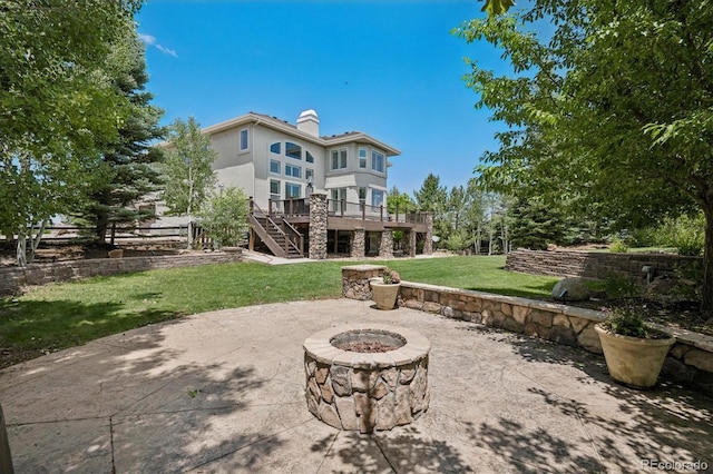 5665 Vistancia Ct, Parker, CO 80134 - view of patio / terrace featuring stairway, an outdoor fire pit, and a wooden deck