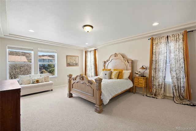 carpeted bedroom featuring recessed lighting and baseboards