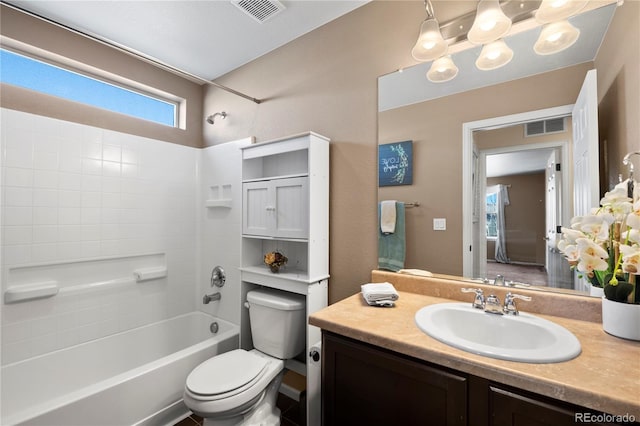 full bathroom with toilet, vanity, visible vents, and shower / bathtub combination