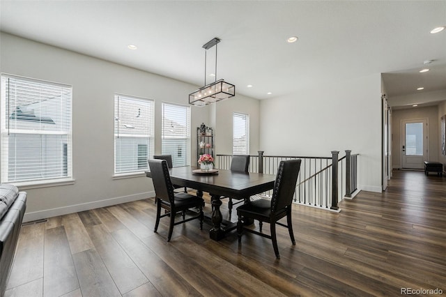 7169 Canyon Sky Trl, Castle Pines, CO 80108 - dining area with dark wood-style flooring, recessed lighting, and baseboards