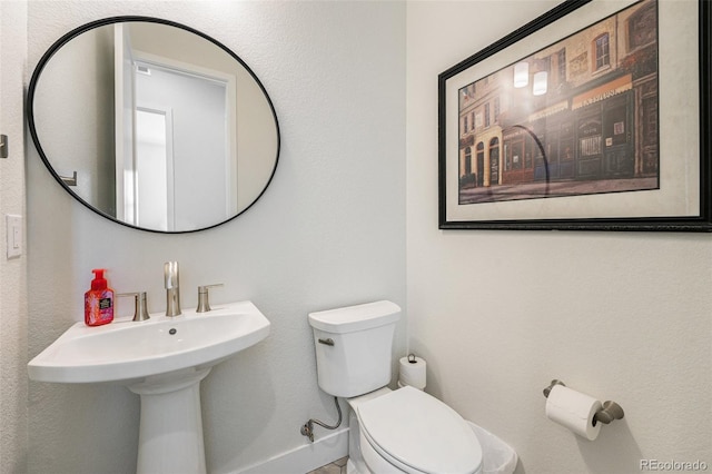 7169 Canyon Sky Trl, Castle Pines, CO 80108 - half bath featuring toilet and baseboards