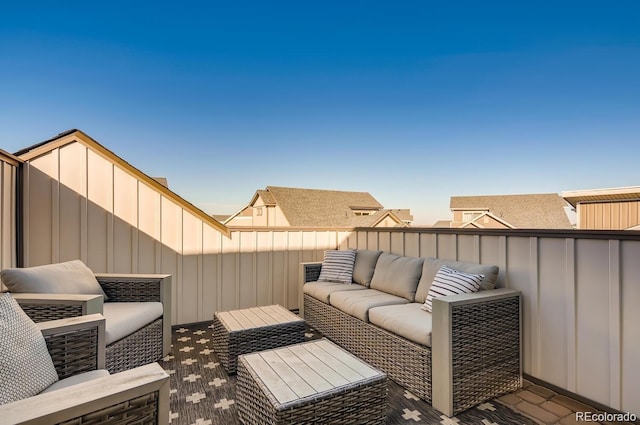 wooden deck featuring an outdoor hangout area