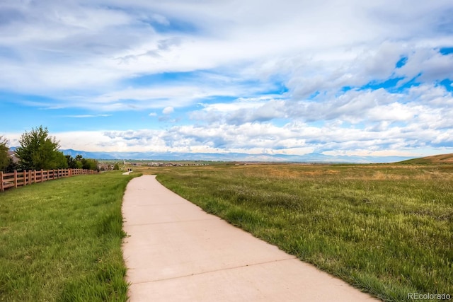 view of home's community with a rural view and a mountain view