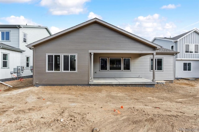 rear view of house with a patio