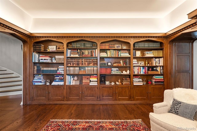 sitting room featuring dark wood-style flooring