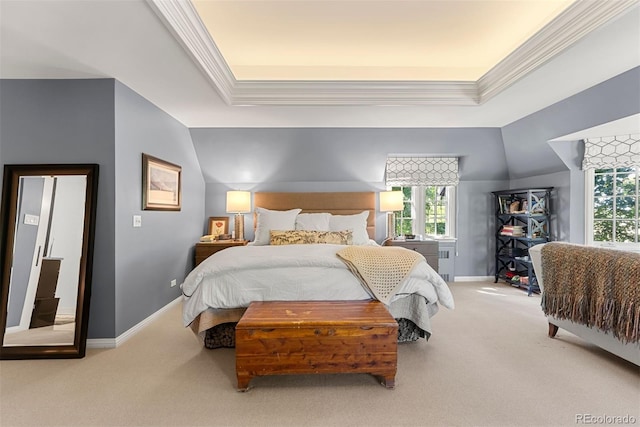 bedroom with carpet floors, baseboards, ornamental molding, and a raised ceiling