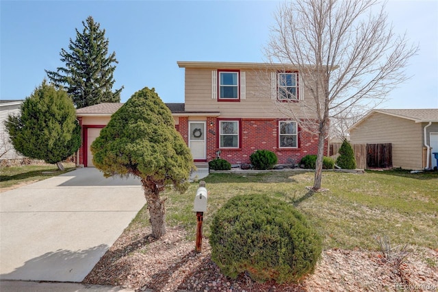 traditional-style home with a garage, brick siding, a front lawn, and concrete driveway