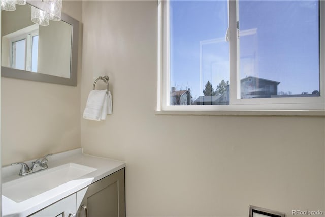 bathroom featuring vanity and a healthy amount of sunlight