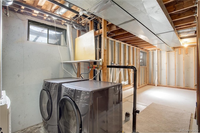 laundry room with independent washer and dryer and laundry area