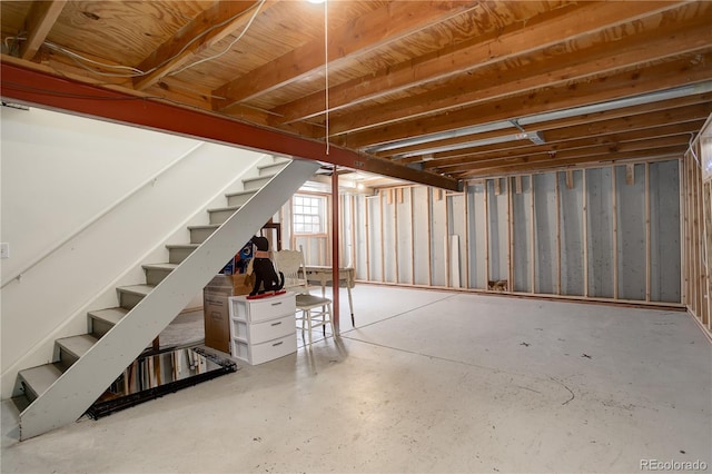 unfinished basement with stairs
