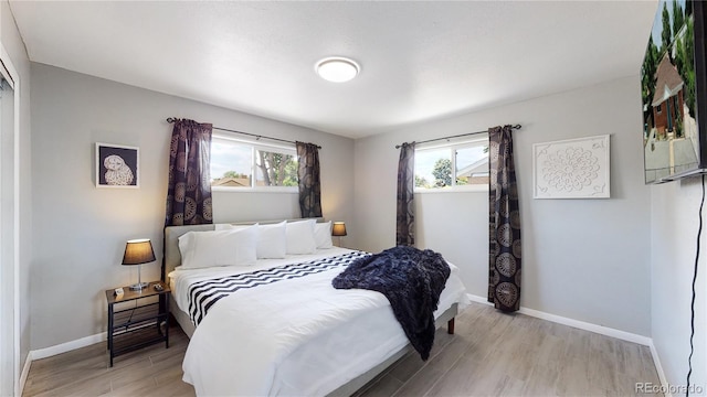 bedroom featuring light hardwood / wood-style floors