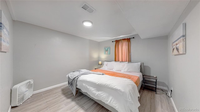 bedroom featuring light wood-type flooring