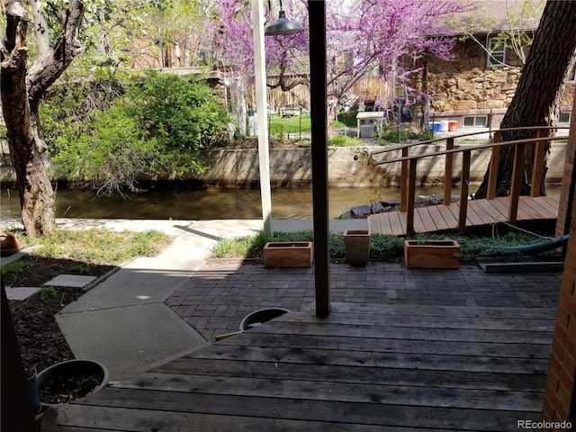 1633 18th St Unit 2, Boulder, CO 80302 - wooden deck with a water view