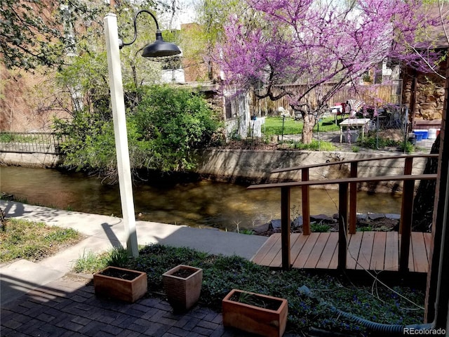 1633 18th St Unit 2, Boulder, CO 80302 - view of patio / terrace with a water view