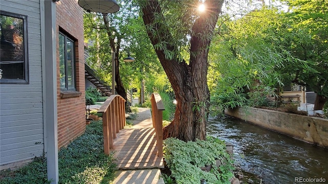 1633 18th St Unit 2, Boulder, CO 80302 - view of yard with a water view and stairway