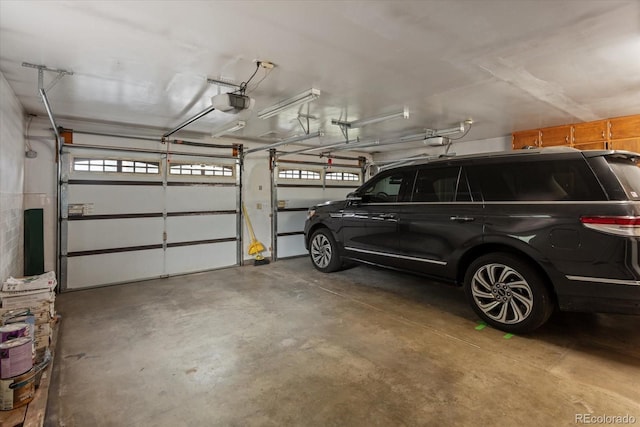 garage featuring a garage door opener