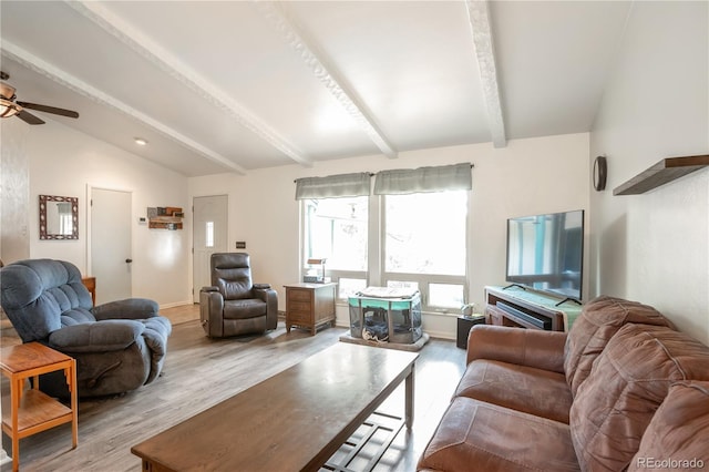 10991 E Vassar Dr, Aurora, CO 80014 - living area featuring wood finished floors, ceiling fan, and baseboards