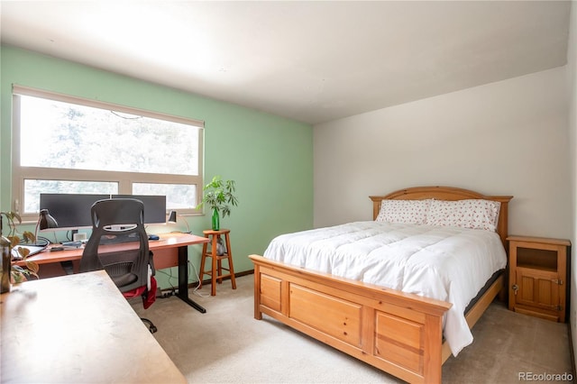 10991 E Vassar Dr, Aurora, CO 80014 - bedroom featuring light colored carpet and a desk