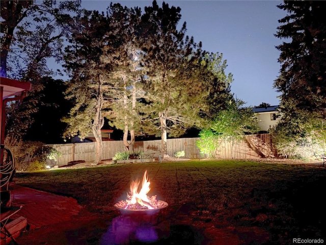 10991 E Vassar Dr, Aurora, CO 80014 - view of yard featuring an outdoor fire pit