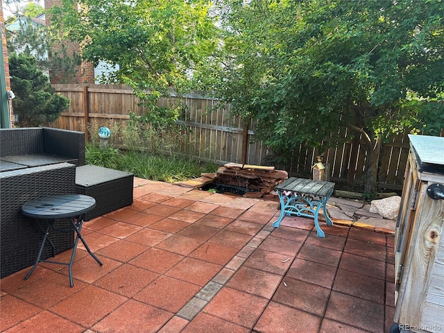 10991 E Vassar Dr, Aurora, CO 80014 - fenced backyard featuring a patio area