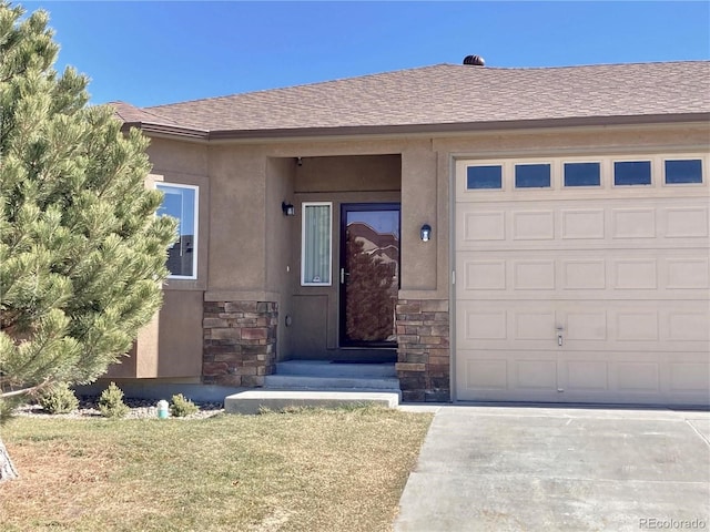 property entrance featuring stone siding, stucco siding, an attached garage, and a shingled roof