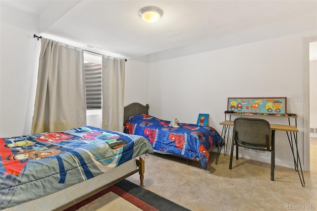 bedroom with a textured ceiling