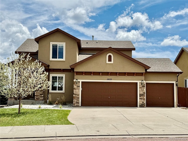 view of front of home featuring stone siding, a garage, stucco siding, concrete driveway, and a shingled roof