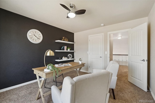 office with carpet, a ceiling fan, and baseboards