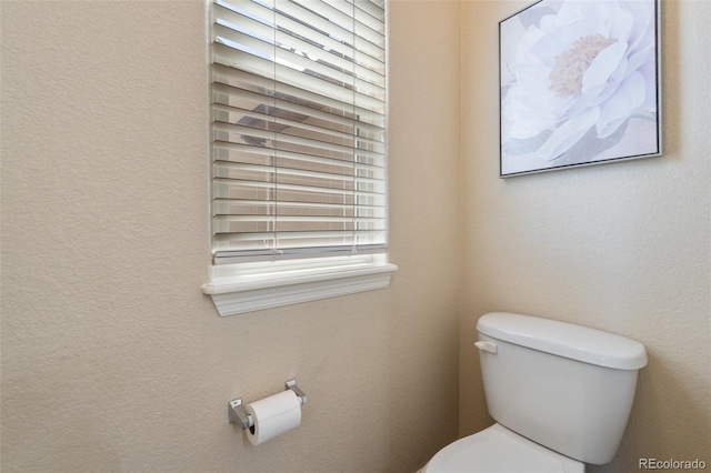 bathroom featuring toilet