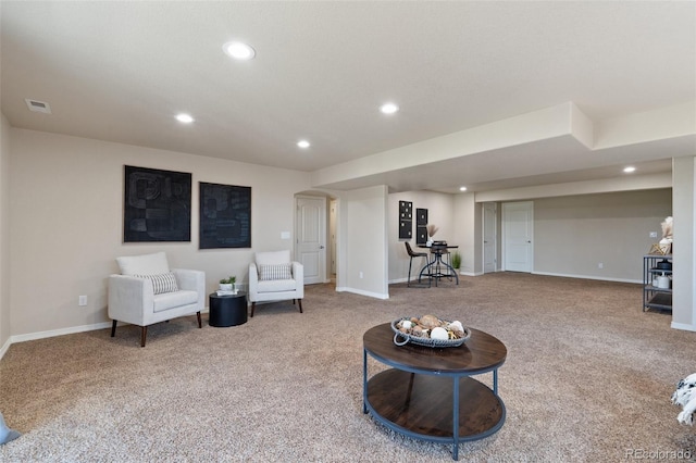 living room featuring carpet floors, recessed lighting, and baseboards