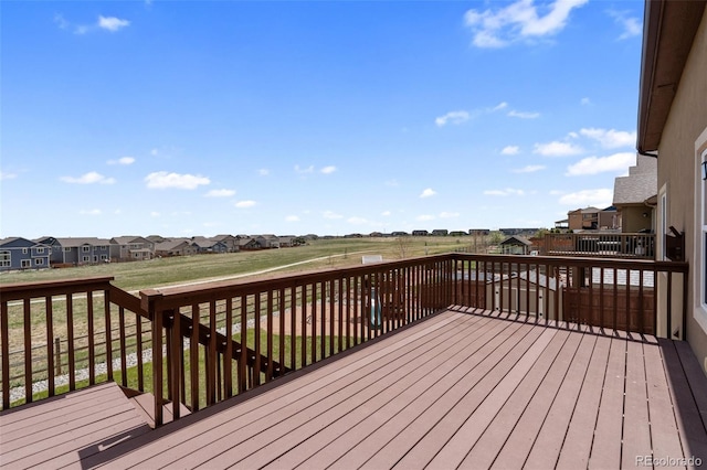 wooden deck featuring a residential view