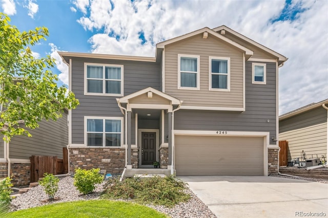 craftsman-style home with a garage