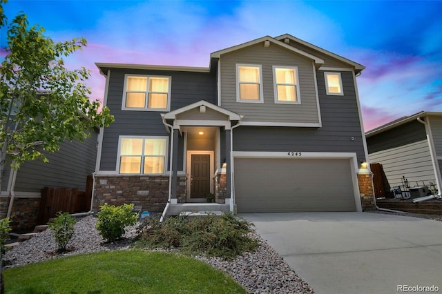 view of front of home with a garage