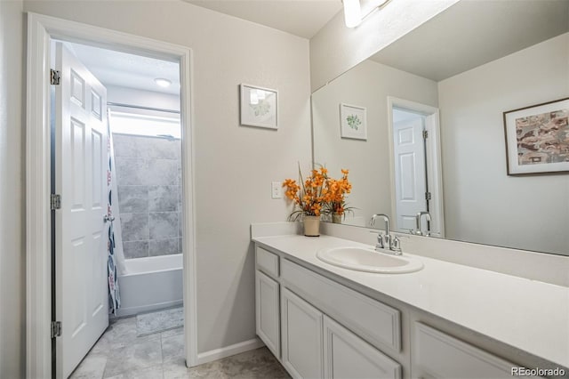 bathroom featuring vanity and shower / bathtub combination with curtain