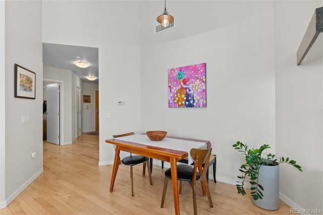 dining room featuring light wood-type flooring