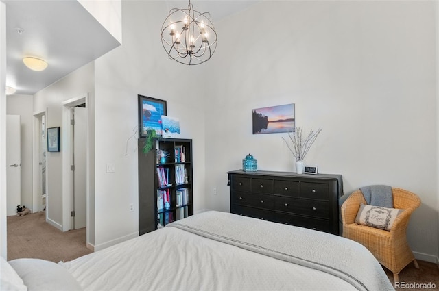 1438 Little Raven St Unit 407, Denver, CO 80202 - carpeted bedroom with a chandelier and baseboards