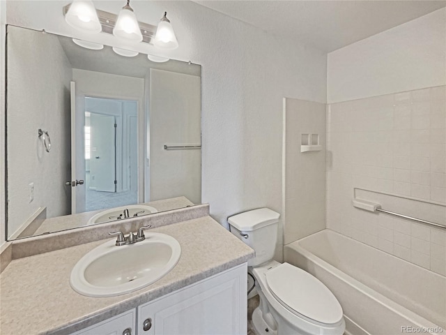 full bathroom featuring vanity, toilet, and shower / washtub combination