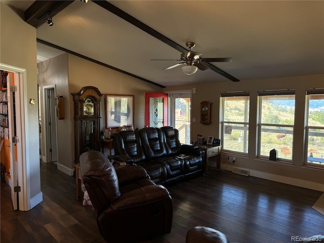 living room featuring beamed ceiling, dark wood-type flooring, and ceiling fan